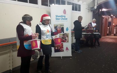 Carol Singing at Weybridge Station – Fundraising for Shooting Star Chase Children’s Hospices