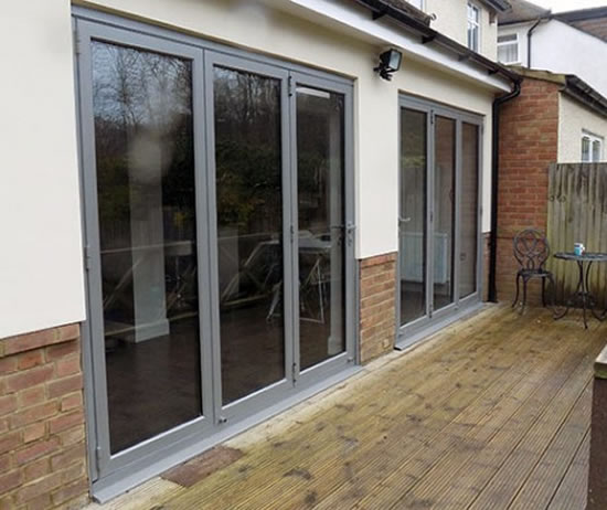 Metallic Bi-Fold Doors - Supply & Fitting by GHI Windows of Weybridge Surrey