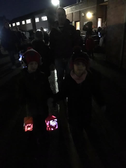 Children with lanterns at Weybridge Town Business Groups Christmas Tree event