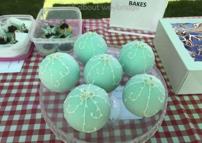 Cakes decorated to look like Christmas Baubles - Winning Cakes in Adult Half Dozen Small Bakes Competition - Cakes in The Great Weybridge Bake-Off 2018