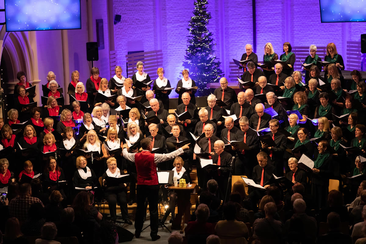 Elmbridge Mixed Choir singing in Woking Christmas Charity Concert