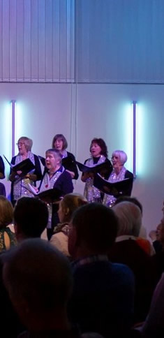 Alto section - Ladies from Elmbridge Choir singing at Walton-on-Thames Surrey