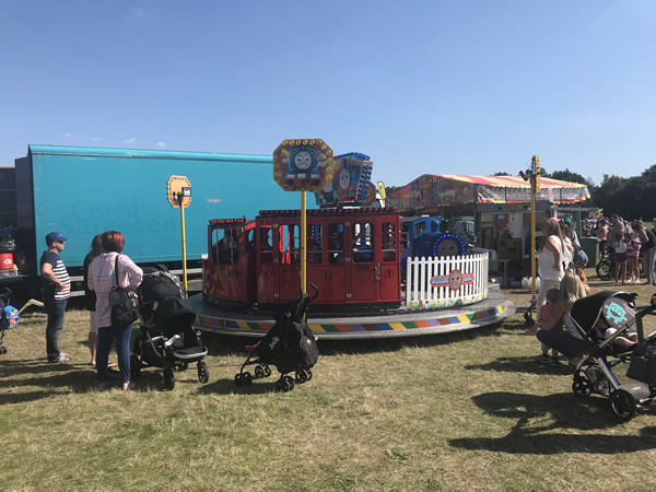 Fairground rides for kids at Brooklands Fun Day Weybridge Surrey