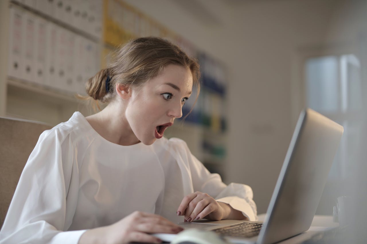 Gambling online - Surprised woman Gambling online - Surprised woman